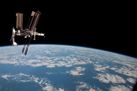 The International Space Station And The Docked Space Shuttle Endeavour