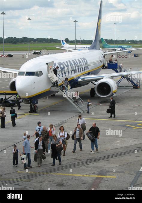 Passengers Leave Ryanair Aircraft On The Apron At Dublin Airport Hi Res