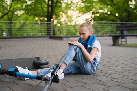 Electric Scooter Accident Girl Suffering Of Pain After Knee Injury