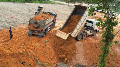 New Project Processing Dump Truck Unloading Soil And Heavy Dozer Moving