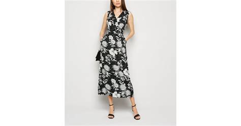 Mela Black Floral And Spot Wrap Midi Dress New Look