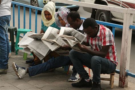 Addis Ababa Ethiopia April Ethiopians Read Newspapers Near