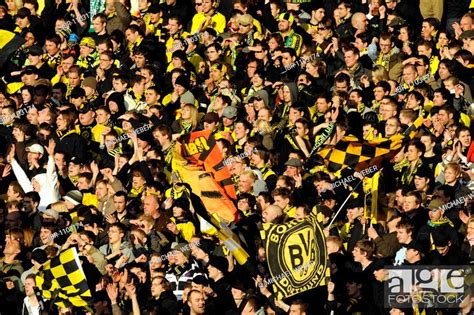 Fans of BVB Borussia Dortmund, spectators, Mercedes-Benz Arena ...