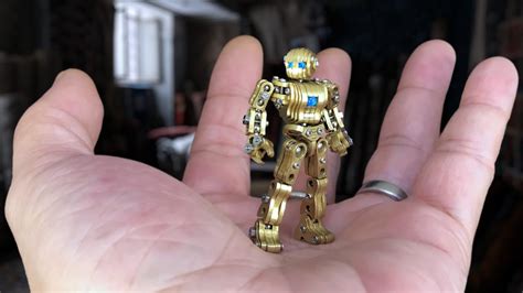 RoboKF Highly Poseable Mini Articulated Metal Robot Figure Brass