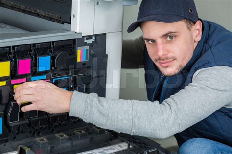 Man Servicing Photocopier Stock Image Colourbox