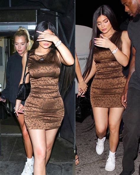 Kylie Jenner Flaunts Her Famous Curves In A Figure Hugging Brown Dress