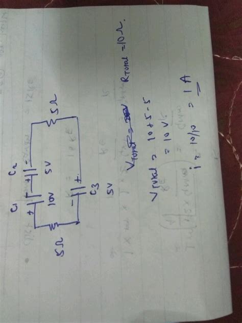 Two Cells Two Resistors And Two Capacitors Are Connected As Shown In