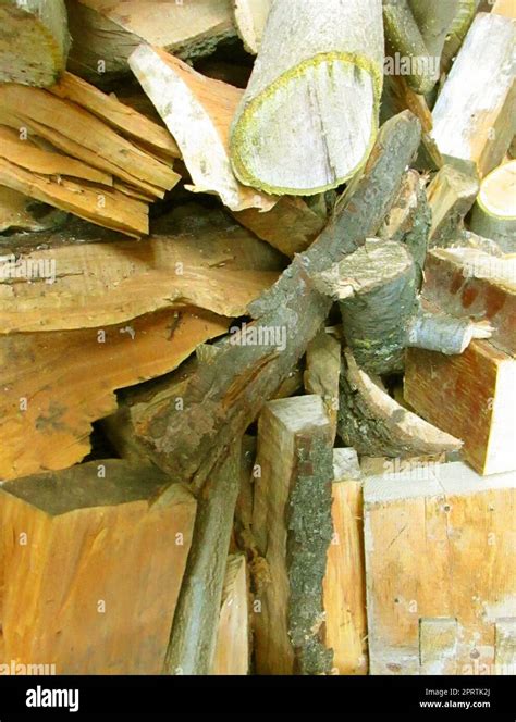 Chopped Firewood Stacked In A Pile For Heating Stock Photo Alamy