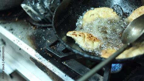 Indian Bread Paranthas Being Deep Fried In Hot Oil Street Food In