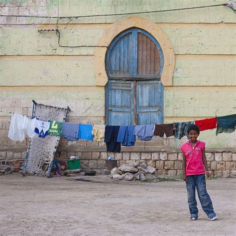 Kid Pausing In Front Of An Old Ottoman House Massawa Eri Flickr