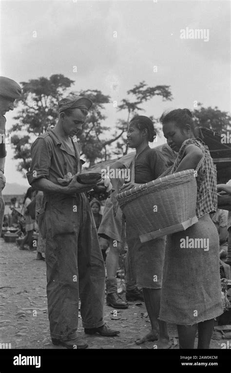 Gombong Dutch Soldier Buys Fruit At The Market Women On A Passer Pasar Date September 1947