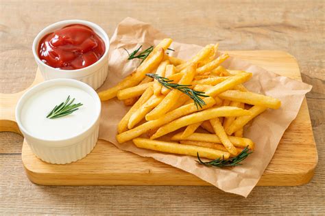 French Fries With Sour Cream And Ketchup Stock Photo At Vecteezy