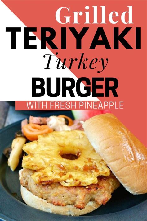 Grilled Teriyaki Turkey Burger With Fresh Pineapple On Black Plate And