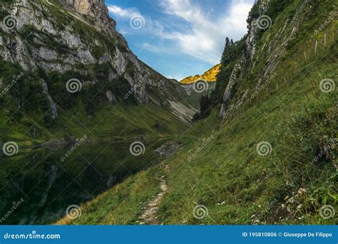 The Moon and the Alpstein Mountain Range Reflecting on the Faelensee ...