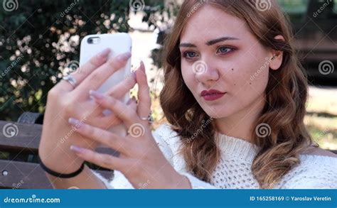 Blonde Woman Taking Selfie In Park And Searching Best Pose Stock Video Video Of Mobile