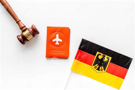 Visa To German Concept Germany Flag Near Passport And Judge Hammer On White Background Top Down