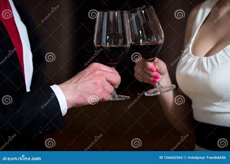 Clink Glasses With Red Wine Of Couple At Meeting Stock Image Image Of