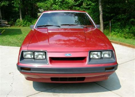 Medium Canyon Red 1986 Ford Mustang Coupe Photo