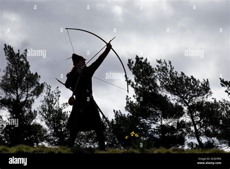 Interpretation Of English Folk Hero Robin Hood Shooting Arrow From