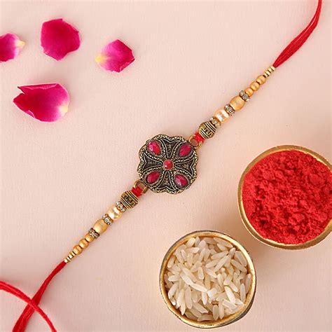 Buy Send Sneh Eye Catchy Red Kundan Rakhi Online FNP