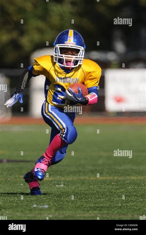 10 year old Midget football player Stock Photo - Alamy