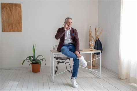 Premium Photo Businessman Having A Phone Call And Looking Involved