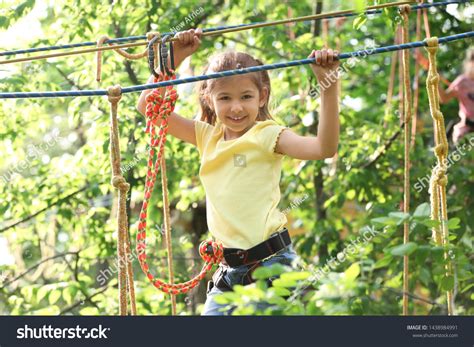 Little Girl Climbing Adventure Park Summer Stock Photo Edit Now