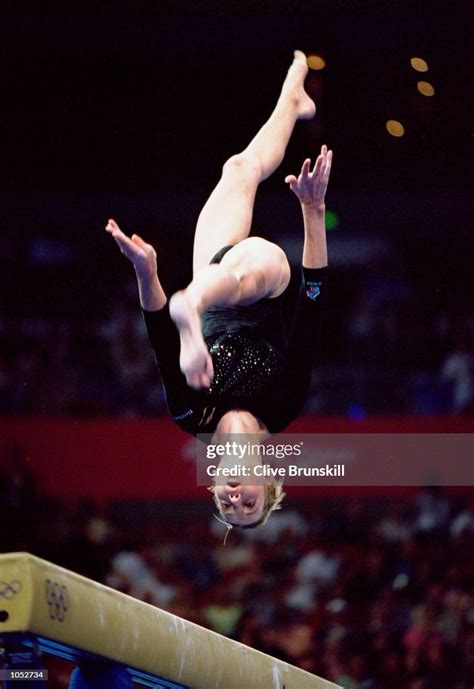 Svetlana Khorkina Of Russia In Action On The Beam During The Womens