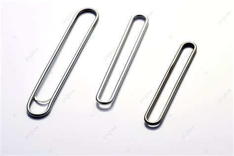 A Collection Of Three Paper Clip Shapes Laying On A White Surface Background, Missing, Variety ...