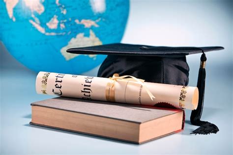 Premium Photo Education Concept Mortar Board Certificate And Book