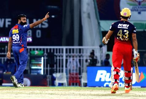 Lucknow Lsg Bowler Amit Mishra Celebrates The Dismissal Of Rcb S