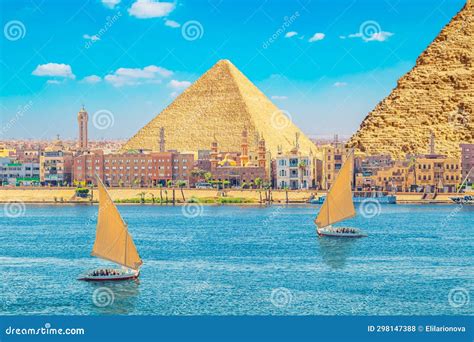 View of the Great Pyramids from the Nile Stock Photo - Image of ...