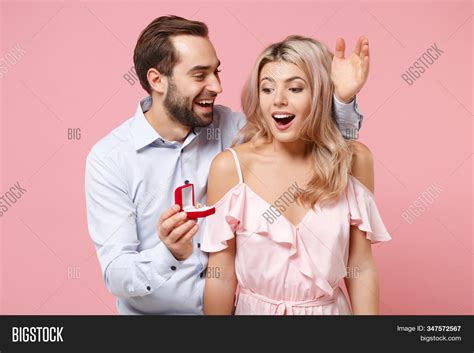 Excited Young Couple Image And Photo Free Trial Bigstock