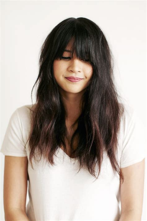 Growing Out Bangs How To Style Long Fringe