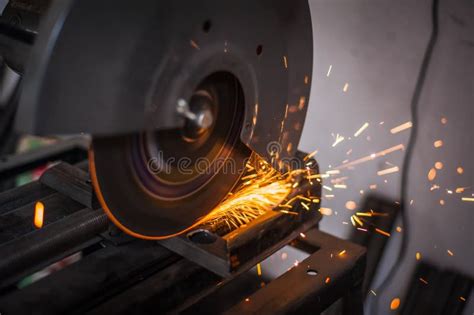 Cutting Metal With Grinder In Workshop Sparks While Grinding Iron