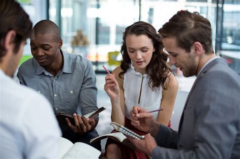 Premium Photo Business Executives Discussing During Meeting