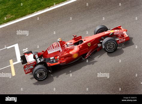 Kimi R Ikk Nen For Ferrari Passes Down The Start Finish Straight At The