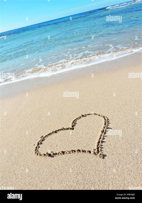 Heart In Sand On Beach