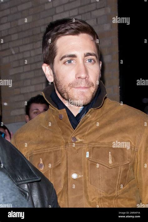 Guided By Bodyguards Actor Jake Gyllenhaal Arrives At The Apple Store In Soho To A Crowd Of