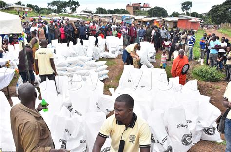 Buddhists Donate Relief Items To Kigungu Fishing Community New Vision