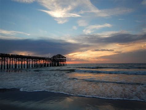 The Cocoa Beach Pier On A Cloudy Day Stock Photo Image Of Shoreline