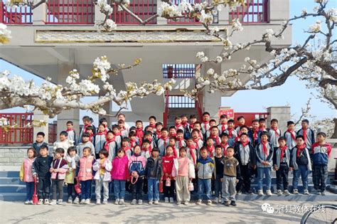 【实践活动】兰沃韩路小学开展游梨园活动梨花冠县师生