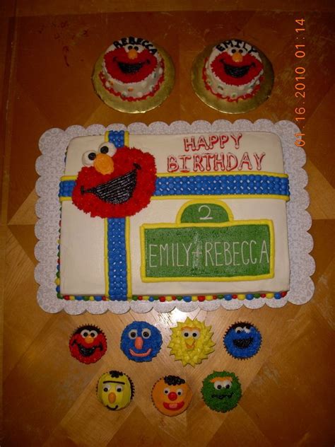 A Birthday Cake With Cupcakes And An Elm Street Sign On The Top Is Made