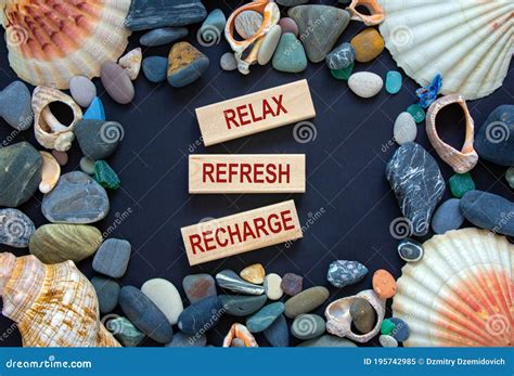 Words Relax Refresh Recharge On Wooden Blocks On A Beautiful Black