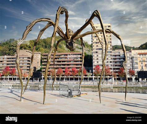 Giant Spider Sculpture Next To The Bilbao And The Guggenheim Museum