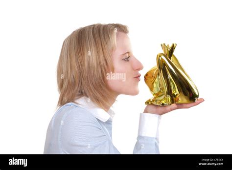 Frog Prince Being Kissed By A Beautiful Young Woman Stock Photo Alamy