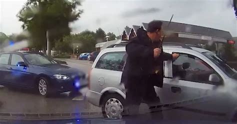 The Dramatic Moment Police Smash Window Of Drug Driver In Tesco Car