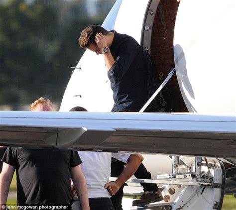 Harry Styles And One Direction Band Mates Arrive At Glasgow Airport In