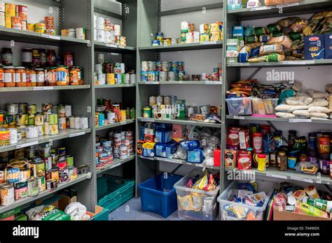 Storage Shelves In A Trussell Trust Local Church Food Bank Warehouse