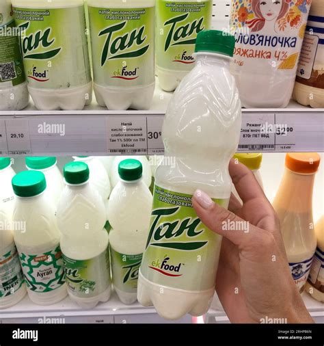 15072023 Ukraine Kharkov Bottle Of Ayran In Hand Shopping In